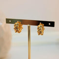 Arete argolla con relieve
