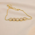 Pulsera ajustable 5 zirconias redondas