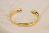 Brazalete cruzado