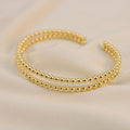 Brazalete perla dorado