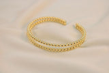 Brazalete perla dorado