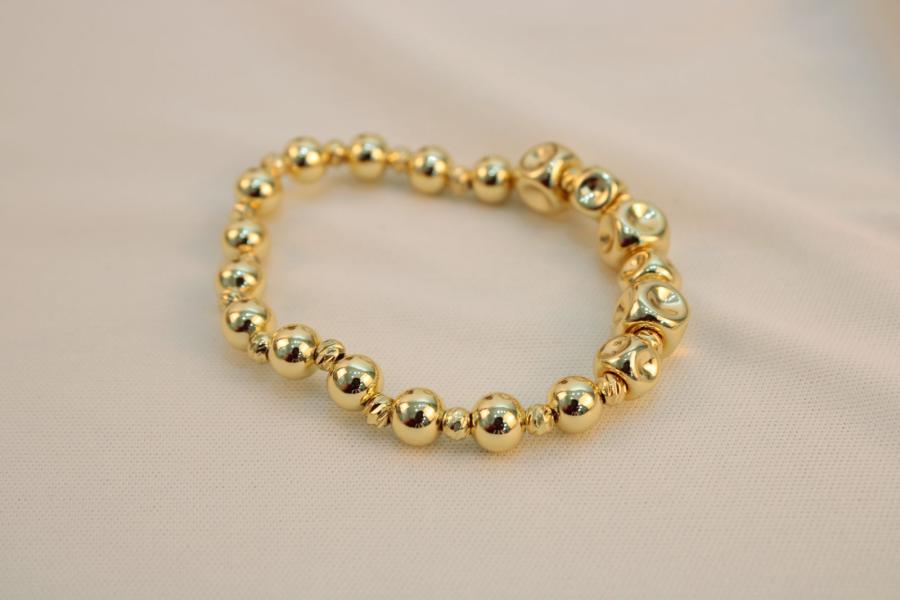 Pulsera ajustable perlas doradas
