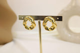 Arete circular con relieve