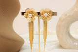 Arete flor largo con perla blanca