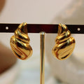 Arete acero caracol grande