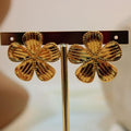 Arete acero flor 5 petalos circular