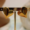 Arete acero corazon con relieve