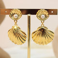 Arete concha doble con perla