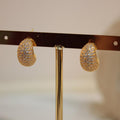 Arete media luna con brillos