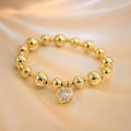 Pulsera de perlas doradas