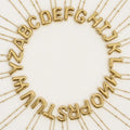 Dije De Iniciales De Globo Dorado